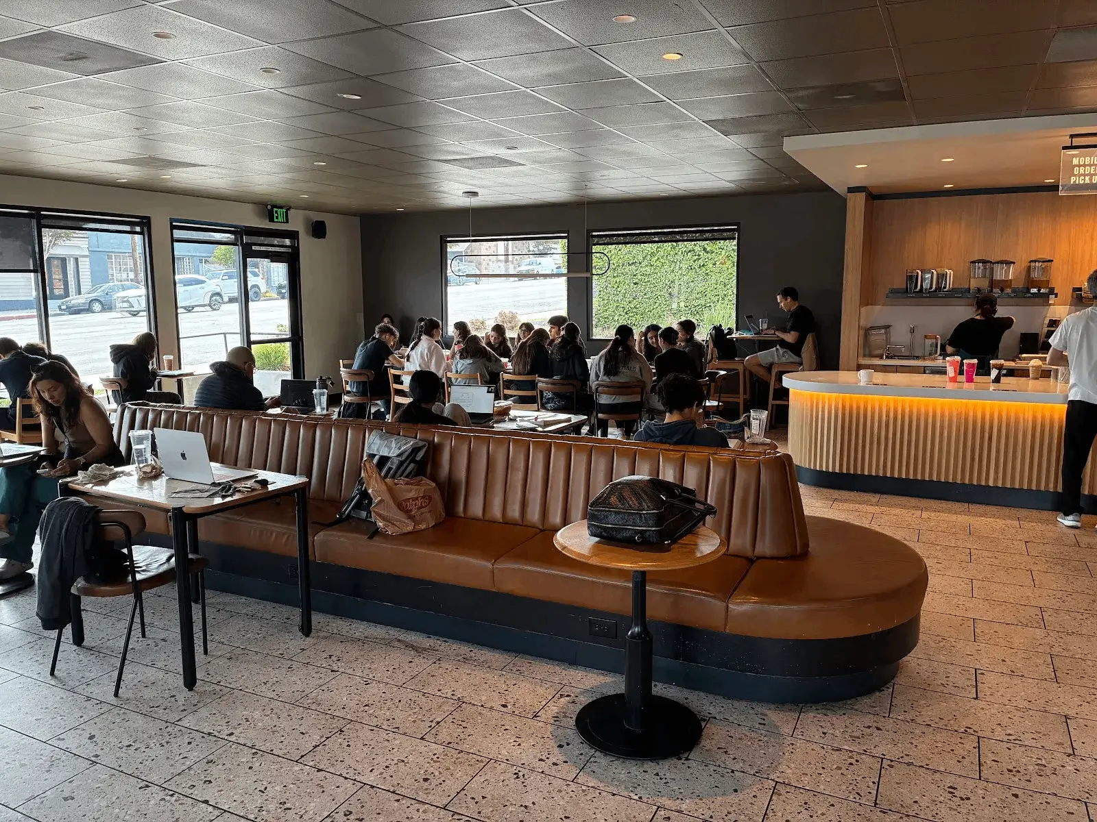 A Writer Goes Into A Starbucks and starts writing (That's his table over to the left in the middle with the MacBook Air)